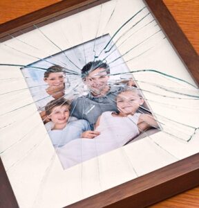 Shattered glass on family portrait